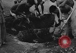 Image of house on fire China, 1945, second 35 stock footage video 65675042297