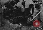 Image of house on fire China, 1945, second 36 stock footage video 65675042297