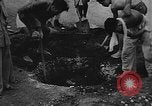 Image of house on fire China, 1945, second 37 stock footage video 65675042297