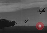Image of house on fire China, 1945, second 42 stock footage video 65675042297