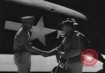 Image of house on fire China, 1945, second 50 stock footage video 65675042297