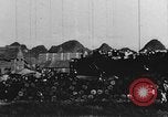 Image of house on fire China, 1945, second 4 stock footage video 65675042298