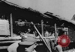 Image of house on fire China, 1945, second 12 stock footage video 65675042298