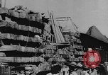 Image of house on fire China, 1945, second 13 stock footage video 65675042298