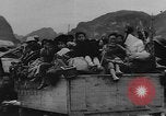 Image of house on fire China, 1945, second 31 stock footage video 65675042298