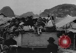 Image of house on fire China, 1945, second 32 stock footage video 65675042298