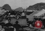 Image of house on fire China, 1945, second 33 stock footage video 65675042298