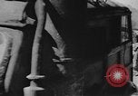 Image of house on fire China, 1945, second 37 stock footage video 65675042298