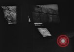 Image of house on fire China, 1945, second 38 stock footage video 65675042298
