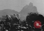 Image of house on fire China, 1945, second 46 stock footage video 65675042298