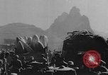 Image of house on fire China, 1945, second 47 stock footage video 65675042298