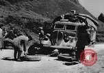 Image of house on fire China, 1945, second 49 stock footage video 65675042298