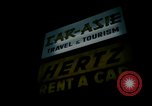 Standbild Neon Sign Saigon Vietnam, 1964, aus Sekunde 6 historischem Filmmaterial Videoclip 65675042316