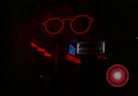 Standbild Neon Sign Saigon Vietnam, 1964, aus Sekunde 14 historischem Filmmaterial Videoclip 65675042316