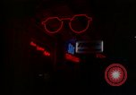 Standbild Neon Sign Saigon Vietnam, 1964, aus Sekunde 16 historischem Filmmaterial Videoclip 65675042316