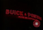 Standbild Neon Sign Saigon Vietnam, 1964, aus Sekunde 17 historischem Filmmaterial Videoclip 65675042316