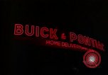 Standbild Neon Sign Saigon Vietnam, 1964, aus Sekunde 18 historischem Filmmaterial Videoclip 65675042316