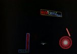 Standbild Neon Sign Saigon Vietnam, 1964, aus Sekunde 26 historischem Filmmaterial Videoclip 65675042316