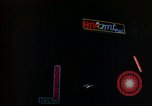 Standbild Neon Sign Saigon Vietnam, 1964, aus Sekunde 28 historischem Filmmaterial Videoclip 65675042316