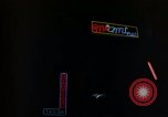 Standbild Neon Sign Saigon Vietnam, 1964, aus Sekunde 29 historischem Filmmaterial Videoclip 65675042316