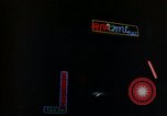 Standbild Neon Sign Saigon Vietnam, 1964, aus Sekunde 30 historischem Filmmaterial Videoclip 65675042316