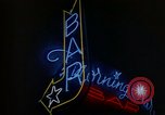 Standbild Neon Sign Saigon Vietnam, 1964, aus Sekunde 38 historischem Filmmaterial Videoclip 65675042316