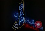 Standbild Neon Sign Saigon Vietnam, 1964, aus Sekunde 41 historischem Filmmaterial Videoclip 65675042316