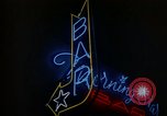 Standbild Neon Sign Saigon Vietnam, 1964, aus Sekunde 43 historischem Filmmaterial Videoclip 65675042316
