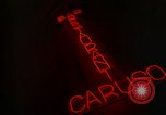 Standbild Neon Sign Saigon Vietnam, 1964, aus Sekunde 45 historischem Filmmaterial Videoclip 65675042316
