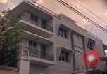 Standbild moderne Häuser Saigon Vietnam, 1964, aus Sekunde 18 historischem Filmmaterial Videoclip 65675042317
