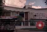 Standbild moderne Häuser Saigon Vietnam, 1964, aus Sekunde 30 historischem Filmmaterial Videoclip 65675042317