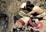 Image of construction of a road Bolivia, 1966, second 32 stock footage video 65675042328