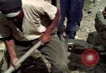 Image of construction of a road Bolivia, 1966, second 52 stock footage video 65675042328