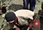 Image of construction of a road Bolivia, 1966, second 53 stock footage video 65675042328