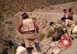 Image of construction of a road Bolivia, 1966, second 58 stock footage video 65675042328