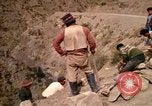 Image of construction of a road Bolivia, 1966, second 61 stock footage video 65675042328