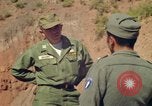 Standbild American Officers Bolivien, 1966, aus Sekunde 57 historischem Filmmaterial Videoclip 65675042329