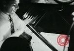 Image of Preserving British books during World War 2 Washington DC USA, 1943, second 52 stock footage video 65675042334