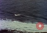 Image of Variety of  U.S. Navy aircraft landing on the USS Forrestal at sea Atlantic Ocean, 1959, second 7 stock footage video 65675042344