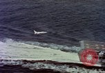Image of Variety of  U.S. Navy aircraft landing on the USS Forrestal at sea Atlantic Ocean, 1959, second 9 stock footage video 65675042344