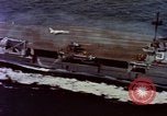 Image of Variety of  U.S. Navy aircraft landing on the USS Forrestal at sea Atlantic Ocean, 1959, second 12 stock footage video 65675042344