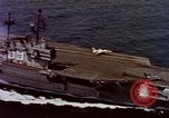 Image of Variety of  U.S. Navy aircraft landing on the USS Forrestal at sea Atlantic Ocean, 1959, second 15 stock footage video 65675042344
