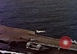 Image of Variety of  U.S. Navy aircraft landing on the USS Forrestal at sea Atlantic Ocean, 1959, second 16 stock footage video 65675042344