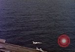 Image of Variety of  U.S. Navy aircraft landing on the USS Forrestal at sea Atlantic Ocean, 1959, second 17 stock footage video 65675042344