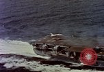 Image of Variety of  U.S. Navy aircraft landing on the USS Forrestal at sea Atlantic Ocean, 1959, second 19 stock footage video 65675042344