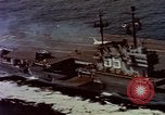 Image of Variety of  U.S. Navy aircraft landing on the USS Forrestal at sea Atlantic Ocean, 1959, second 21 stock footage video 65675042344