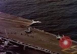 Image of Variety of  U.S. Navy aircraft landing on the USS Forrestal at sea Atlantic Ocean, 1959, second 24 stock footage video 65675042344
