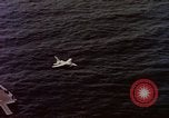 Image of Variety of  U.S. Navy aircraft landing on the USS Forrestal at sea Atlantic Ocean, 1959, second 26 stock footage video 65675042344
