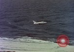 Image of Variety of  U.S. Navy aircraft landing on the USS Forrestal at sea Atlantic Ocean, 1959, second 27 stock footage video 65675042344
