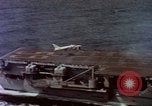 Image of Variety of  U.S. Navy aircraft landing on the USS Forrestal at sea Atlantic Ocean, 1959, second 29 stock footage video 65675042344